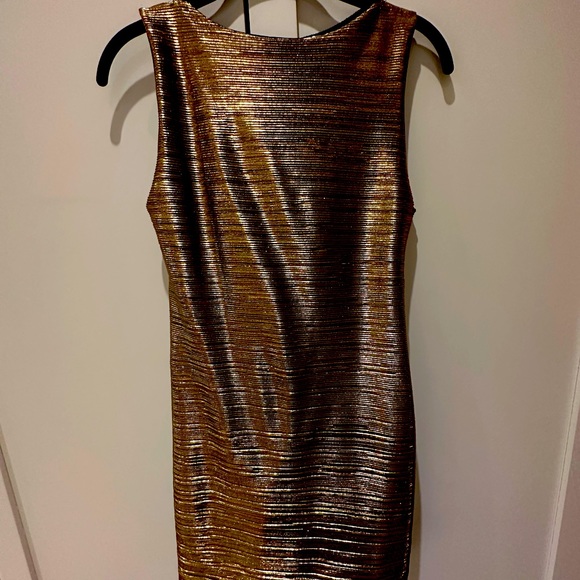 Shiny to tight mini dress with open mesh back Medium but fits XS or S - Picture 1 of 3
